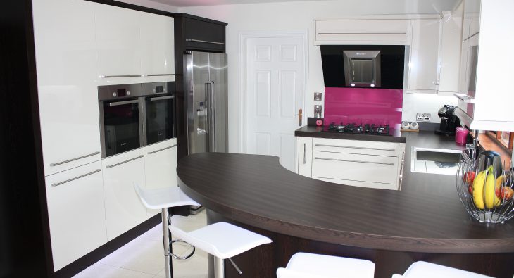 duggan kitchen design with pink panel and lighting